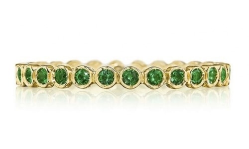An emerald wedding band from TACORI’s Sculpted Crescent collection