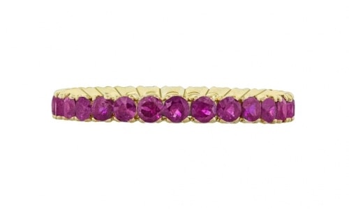 A yellow gold ruby eternity wedding band from Spark