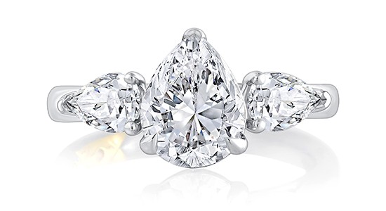 a white gold engagement ring featuring three marquise cut diamonds