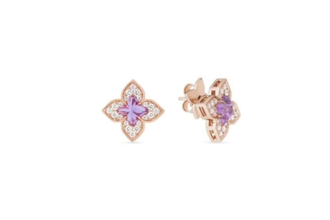 Clover shaped earrings in rose gold with a clover shaped amethyst in the center.