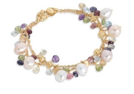 A chain bracelet with a mixture of dangling gemstones from Marco Bicego.