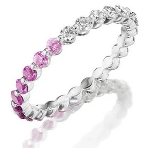 a 14k white gold stackable ring with pink sapphires and white diamonds