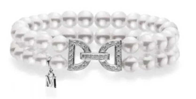 A two-row Mikimoto pearl bracelet with a white gold diamond encrusted clasp, available at Adlers Jewelers.