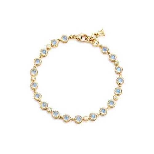 Gold bracelet featuring a series of round, light blue gemstones linked together.