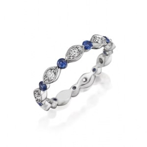 A diamond and sapphire wedding band from Henri Daussi.