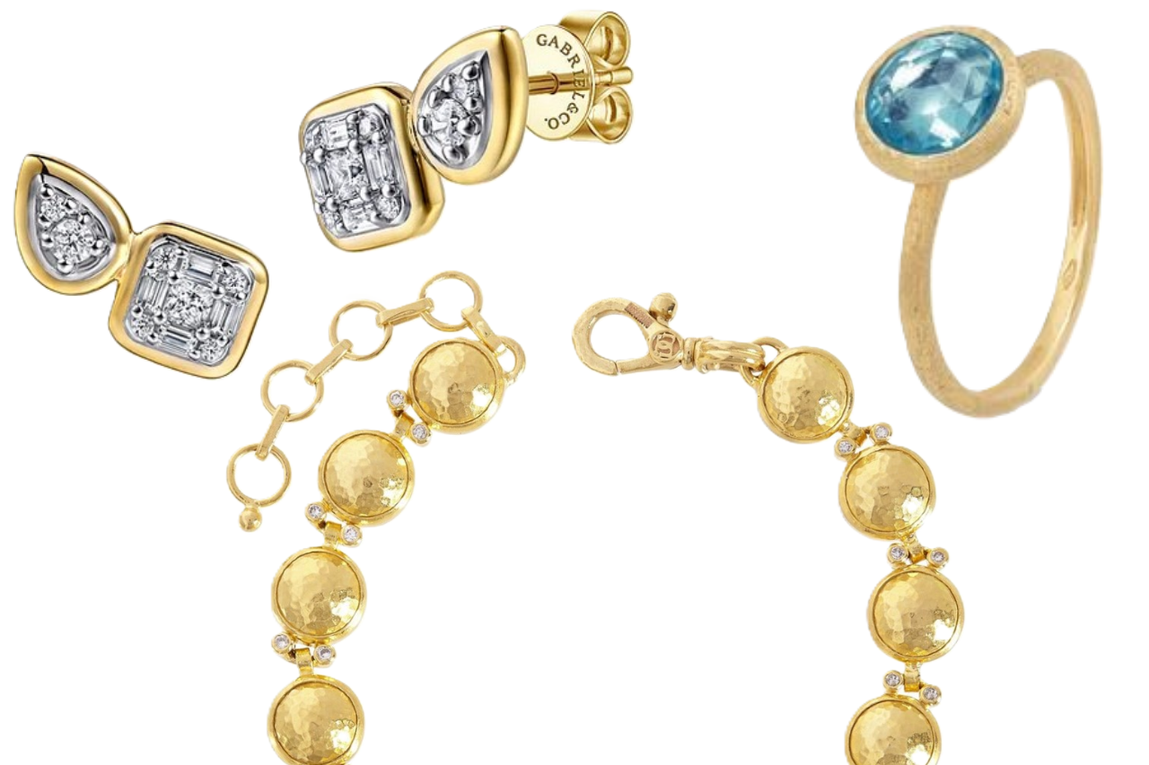 A close-up of three bold pieces of gold jewelry, one pair of earrings, one fashion ring, and one bracelet, all available at Adlers Jewelers.