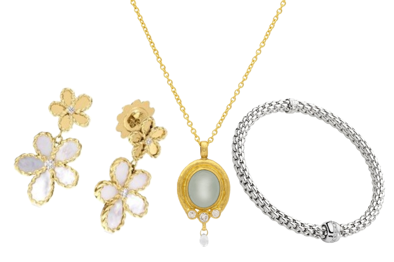 A close-up of three unique pieces of gold jewelry, one pair of earrings, one necklace, and one bracelet, all available at Adlers Jewelers.